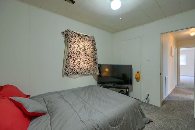 bedroom featuring light colored carpet