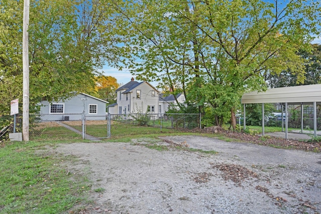 view of yard featuring a carport