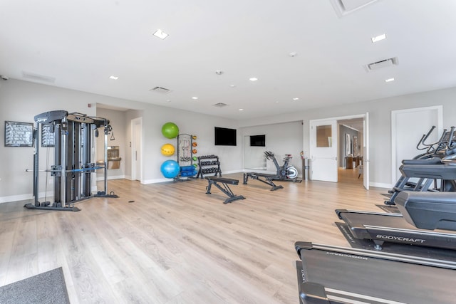 exercise area featuring light wood-type flooring