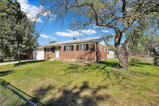 ranch-style home with a front lawn