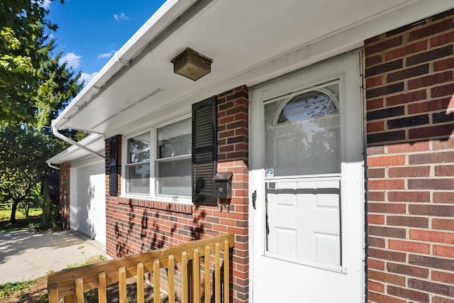 property entrance featuring a garage