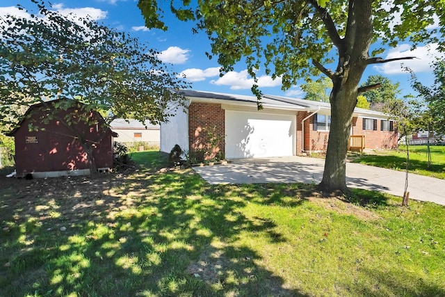 ranch-style house with a front yard and a garage