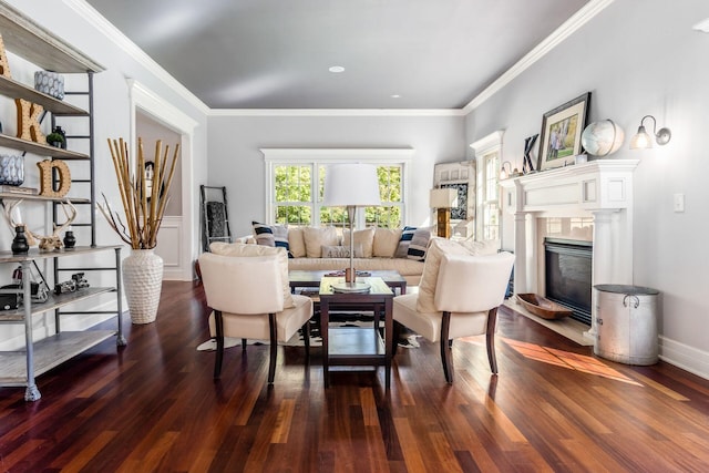 living room with dark hardwood / wood-style floors, a fireplace, and crown molding