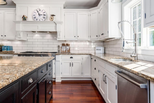 kitchen featuring dishwasher, dark hardwood / wood-style floors, and white cabinetry