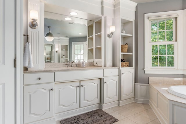 bathroom featuring vanity, tile patterned floors, and ornamental molding