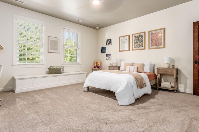 carpeted bedroom with ceiling fan