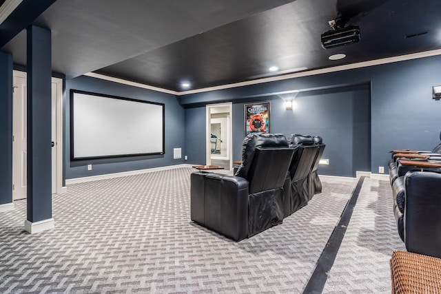 home theater room featuring carpet and ornamental molding