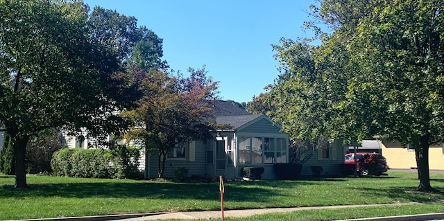 exterior space with a lawn