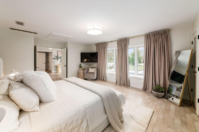 bedroom featuring light hardwood / wood-style floors