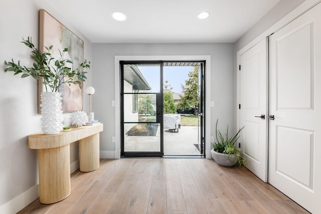 doorway featuring light hardwood / wood-style floors