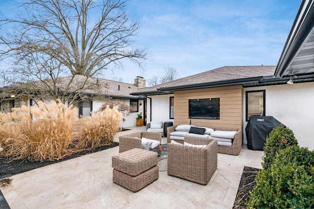 view of patio with a grill and an outdoor hangout area