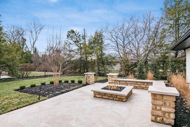 view of patio / terrace featuring a fire pit