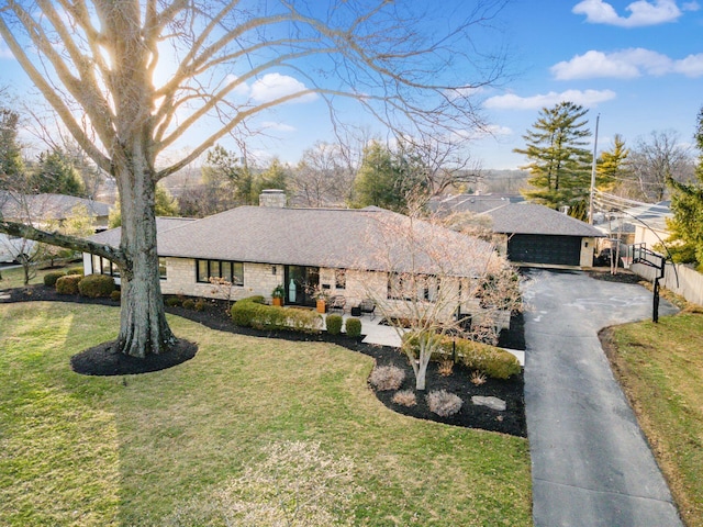 ranch-style home with a front yard