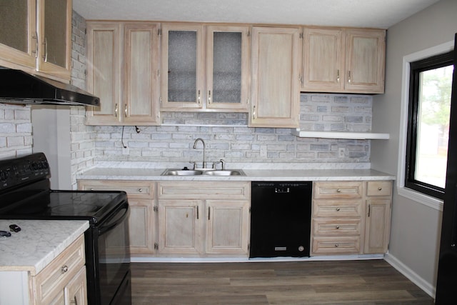 kitchen with backsplash, dark wood-type flooring, sink, black appliances, and light brown cabinets