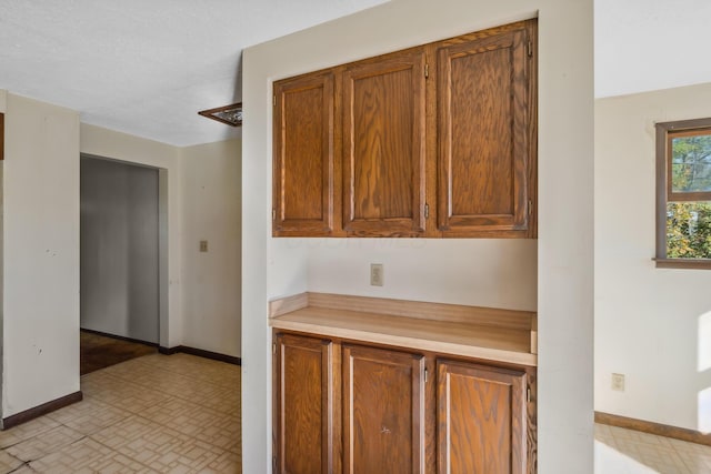 kitchen featuring a textured ceiling