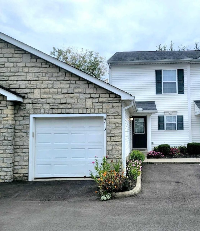 view of front of property featuring a garage