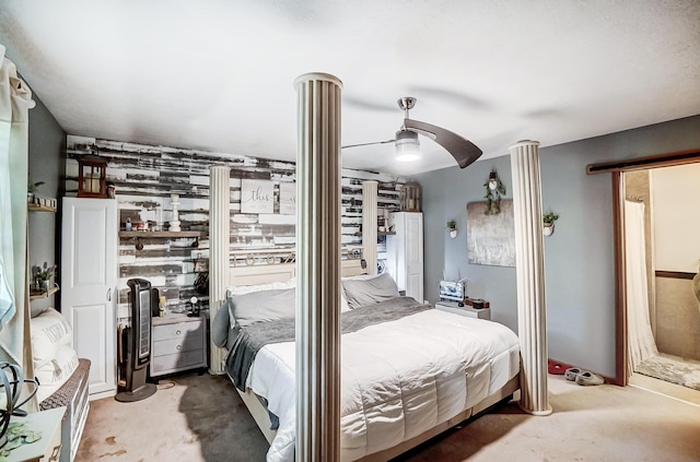 bedroom with ceiling fan and concrete floors