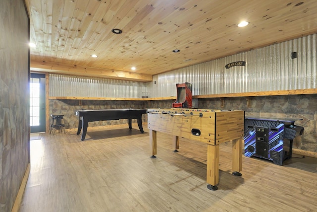 rec room with hardwood / wood-style floors, wood walls, and wood ceiling