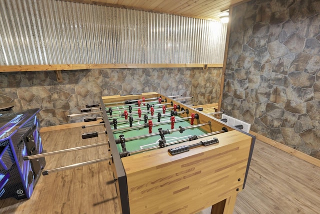 game room with hardwood / wood-style flooring and wooden ceiling