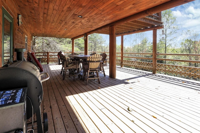 wooden deck with grilling area