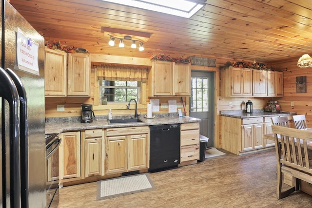 kitchen with wood walls, black appliances, sink, dark hardwood / wood-style floors, and wood ceiling