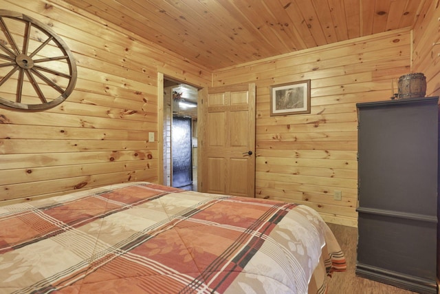 unfurnished bedroom featuring hardwood / wood-style floors, wooden ceiling, and wooden walls