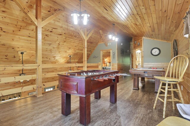 recreation room with hardwood / wood-style floors, wooden ceiling, wooden walls, and vaulted ceiling