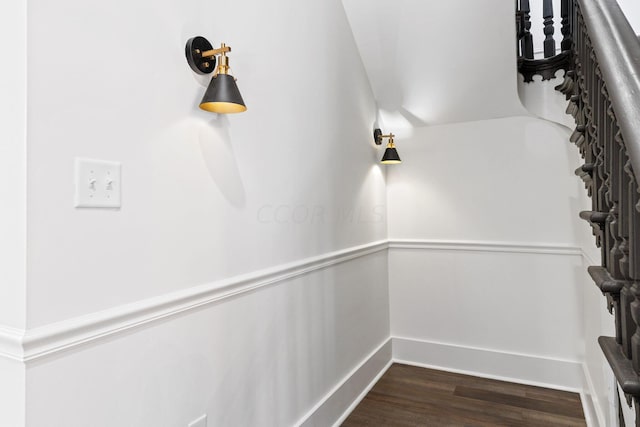 stairs with hardwood / wood-style floors