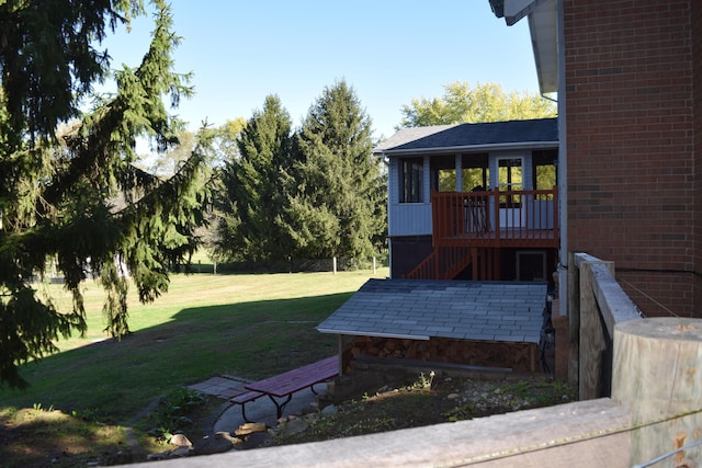 view of yard featuring a deck