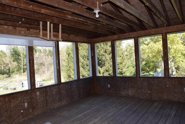 unfurnished sunroom featuring a healthy amount of sunlight