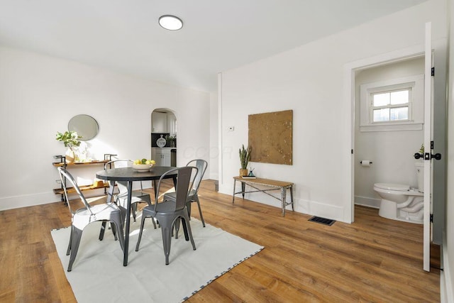 dining room featuring hardwood / wood-style flooring