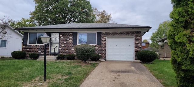 view of front of house with a garage and a front yard