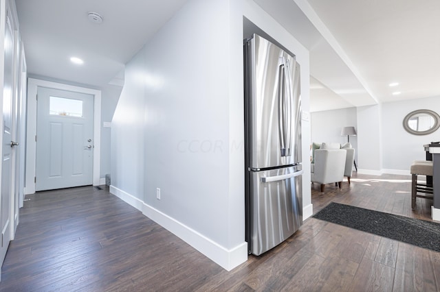 entryway featuring dark wood-type flooring