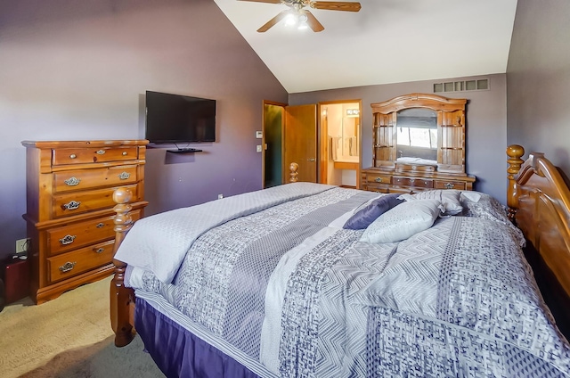 carpeted bedroom featuring ceiling fan and vaulted ceiling