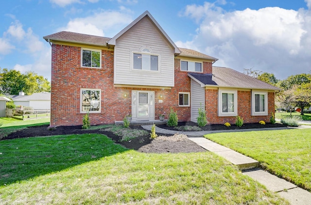 view of front facade with a front yard