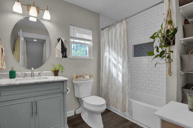 full bathroom with vanity, toilet, wood-type flooring, and shower / tub combo with curtain