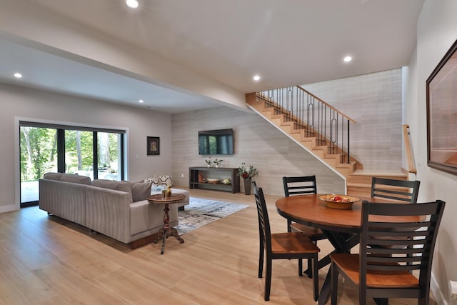 living room with light hardwood / wood-style flooring