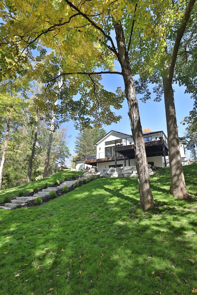 view of yard with a wooden deck