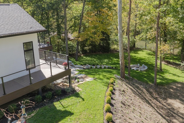 view of yard featuring a deck