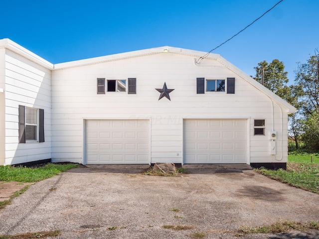 exterior space with a garage