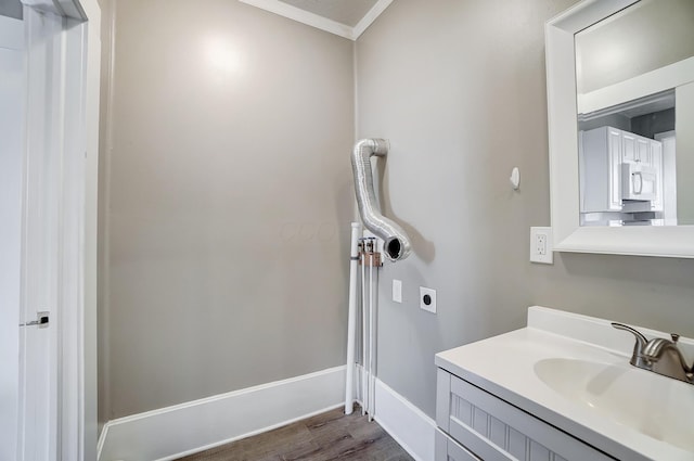 bathroom with vanity and wood-type flooring