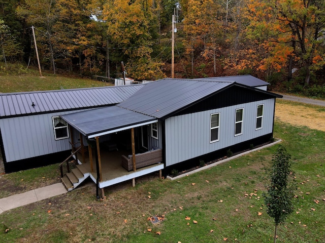 exterior space with a front yard