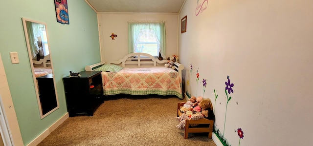 bedroom featuring carpet flooring and ornamental molding