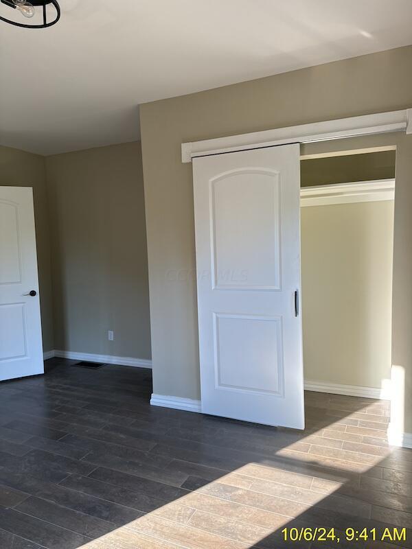 interior space featuring dark hardwood / wood-style floors