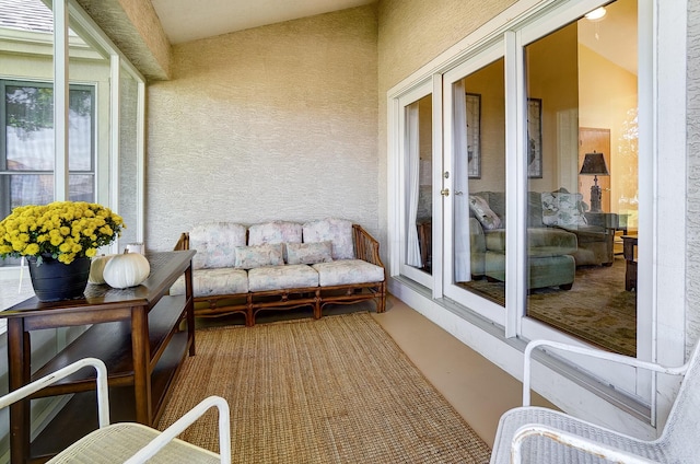 balcony featuring french doors