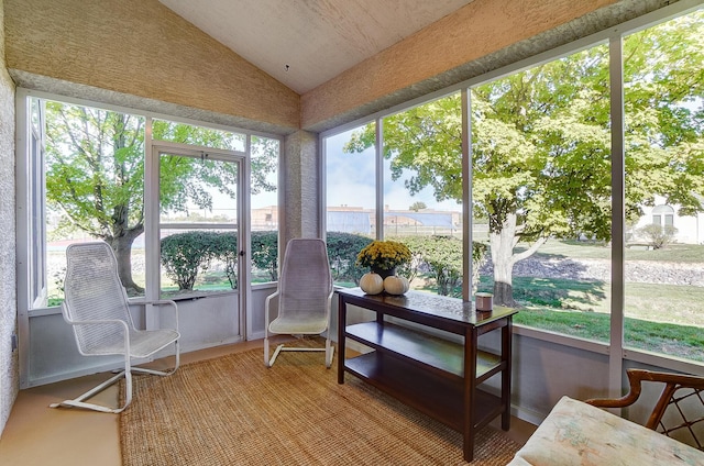 sunroom / solarium with vaulted ceiling