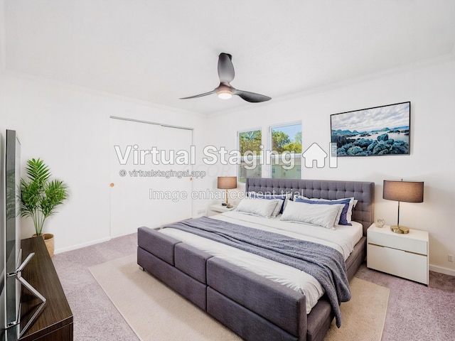 bedroom featuring ceiling fan, light colored carpet, and ornamental molding