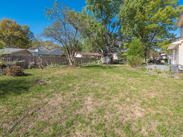 view of yard with central AC