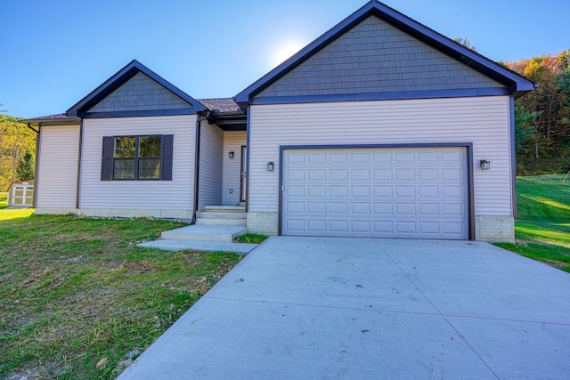 view of front facade with a garage and a front yard