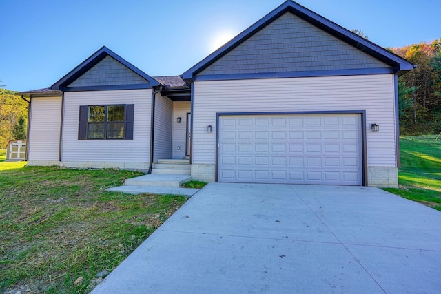 32360 Redbud Ln, Logan, OH 43138 - view of front of property with a garage, driveway, and a front lawn
